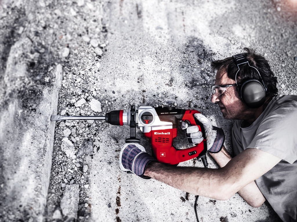 man drills stone pieces from a stone