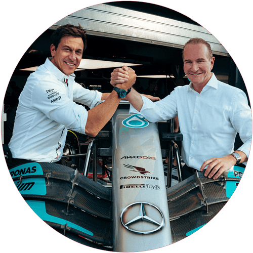 andres krois and toto wolff shake hands